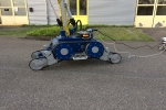Roboterfahrzeug Kettenausleger